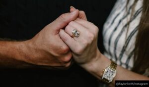 Romantic moment as Travis Kelce holds Taylor Swift’s hand to display her engagement ring